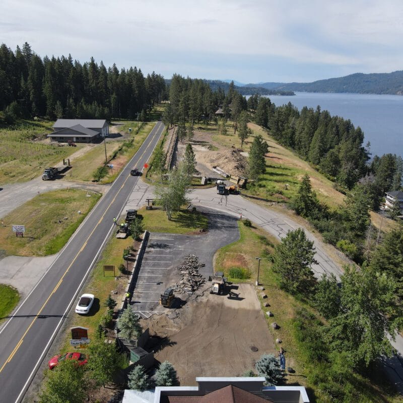 Freshly completed asphalt remove and replace project at a commercial job site in Spokane area showing smooth new pavement after winter damage repair