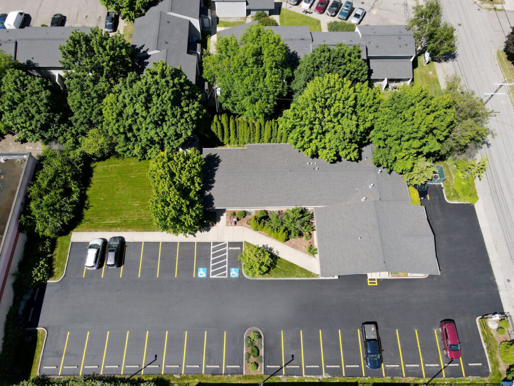 Completed asphalt parking lot with fresh striping at Loftus Family Dental in Coeur d'Alene.