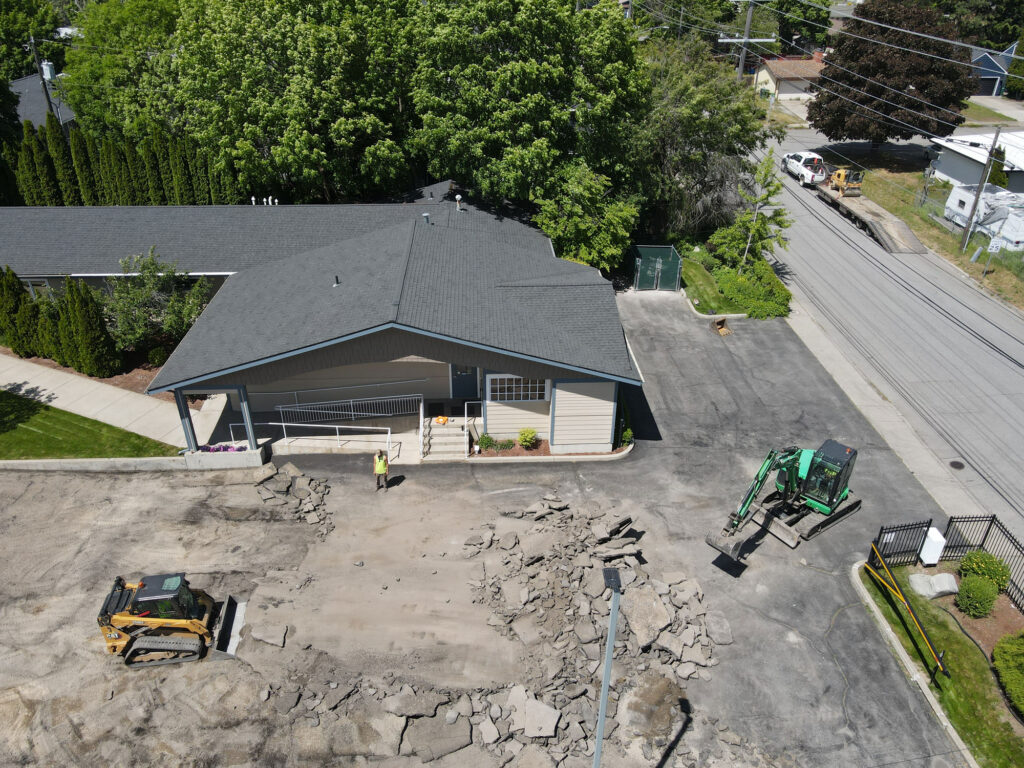 loftus-family-dental-parking-lot-demolition-coeur-dalene Parking lot after asphalt removal and grading before paving at Loftus Family Dental in Coeur d'Alene.