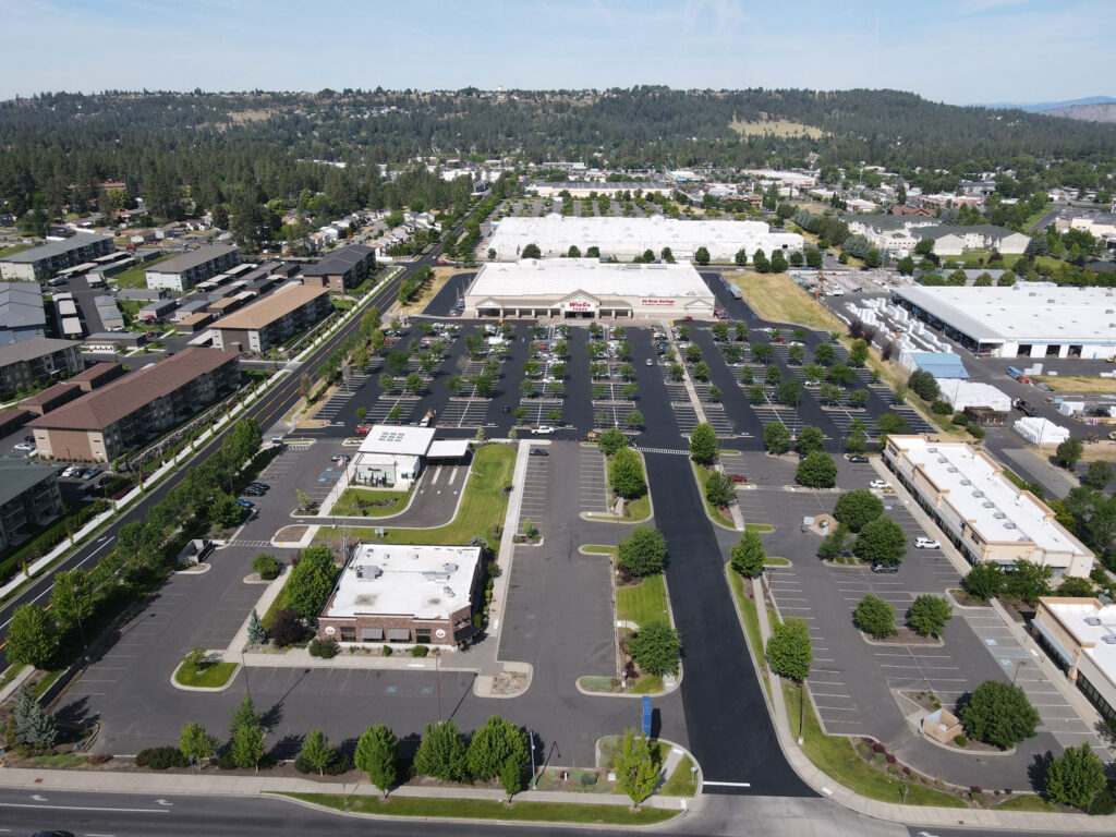 WinCo Foods Parking Lot Sealcoating in Spokane Aerial view of the completed WinCo Foods parking lot after asphalt maintenance and sealcoating in Spokane, Washington.