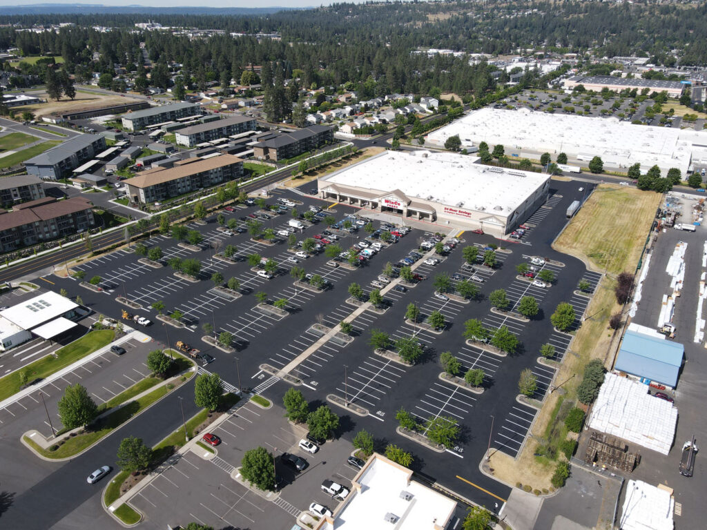 Aerial view of fresh parking lot striping at WinCo Foods in Spokane, Washington.